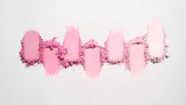 Overhead Shot of Pink Powder Smudges on Grey Background