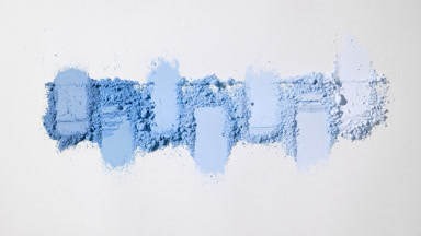 The thread dramatically alters the blue powder formations
