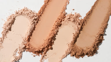Aerial Close-Up of Beige to Brown Powder Smears