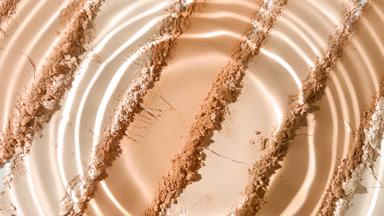 Droplet Ripple on Beige and Brown Palette Surface