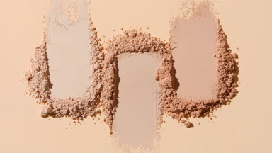 Dynamic Shadows on Beige Powder Piles in Tan Setting