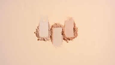 Shifting Shadows on Beige Powder Smears in Line