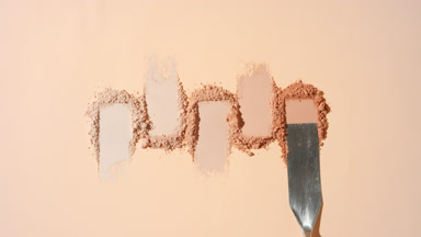 Overhead View of Five Beige Powder Heaps