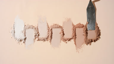 Overhead View of Beige to Brown Powder Heaps in Row