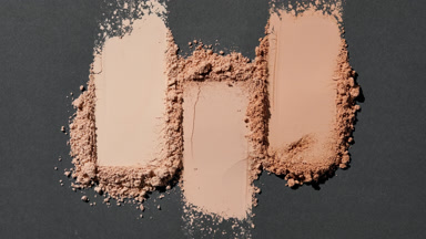 Extreme Close-Up of Beige Powder Heaps with Dynamic Lighting