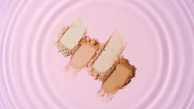 Water Droplet Over Beige and Brown Powder on Light Rose