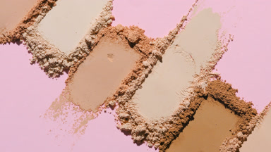 Macro Close-Up of Beige to Brown Powder Streaks on Pink