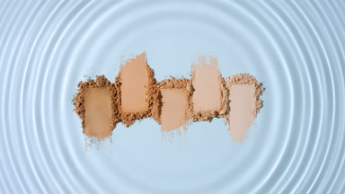 Water Droplet Creating Circles Over Skin Tone Powder