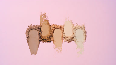 Pale Pink Backdrop with Dynamic Skintone Powder Smears