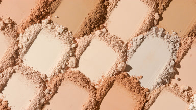 Mosaic of Beige to Brown Powder with Shifting Shadows