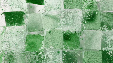 Green Powder Explosion on Square Mosaic Surface