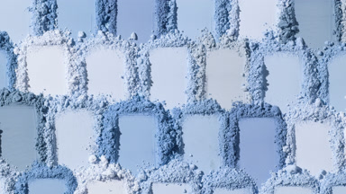 Extreme Close-Up of Pale Blue Powder Smears