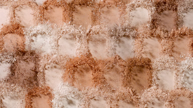 Slow Motion of Beige to Brown Powder Smears