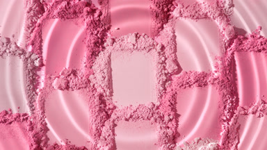 Ultra-Close Shot of Droplet on Pink Powder Smears