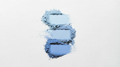 Top-Down View of Blue Powder Smears with Changing Shadows