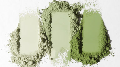Extreme Close-Up of Aligned Pale Green Powder Smears
