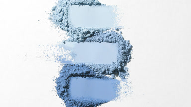Dynamic Blue Powder Smears on Grey Background with Shadows