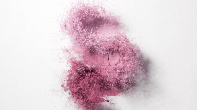 Pink Powder Mounds Bursting in Slow Motion on Grey
