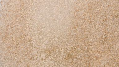 Slow-Motion Burst of Beige Powder from Above