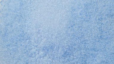 Slow-Motion Blue Powder Shattering from Above