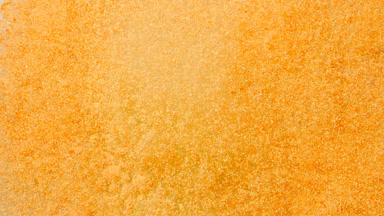 Slow-Motion Shattering of Yellow Powder from Above