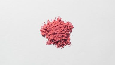 Red Powder Macro Close-Up on Muted Grey Background