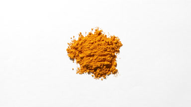 Yellow Powder Close-Up on Light Gray Background