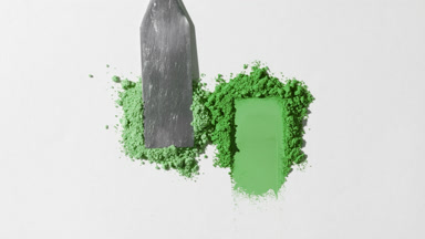 Green Loose Powder Heaps on Gentle Grey Background