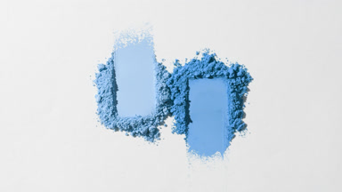 Blue and Pale Blue Smeared Powder Heaps on Light Grey