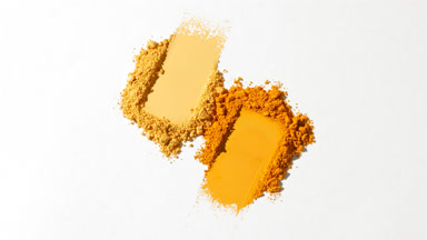 Extreme Close-Up of Orange and Yellow Eyeshadow Smears