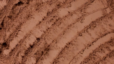 Slow-Motion Burst of Brown Powder for Bronzer Ad