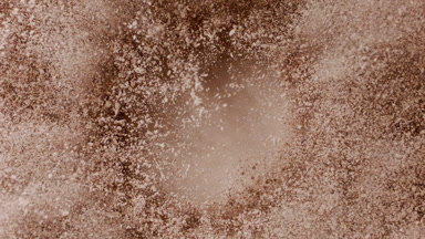 Skin Tone Powder Burst in Slow Motion from Above