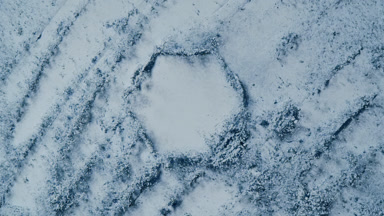 Pale Blue Powder Burst with Knife Trails from Above
