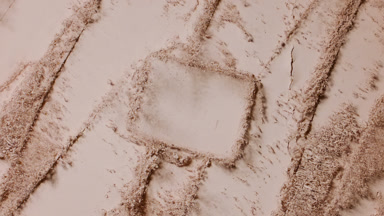Skin Tone Powder Burst with Knife Trails from Top Angle