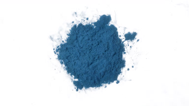 Blue Reagent Torrent in Petri Dish on White Backdrop