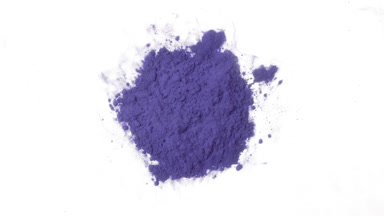 Violet Dust Cloud in Petri Dish from Above
