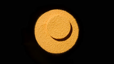 Yellow Fine Powder in Round Shape with Moving Shadows