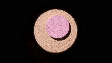 Dynamic Blush Powder Display with Rotating Light Effects