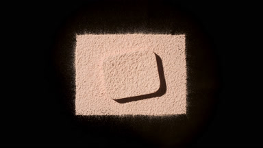 Beige Powder Top-Down Shot with Shadows on Black