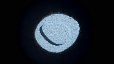 Blue Powder and Puff with Dynamic Shadows on Black