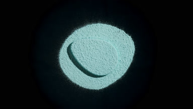 Cyan Powder and Puff with Changing Shadows on Dark Field