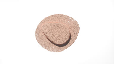 Top-Down View of Beige Powder with Dynamic Shadows