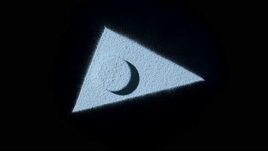 Blue Powder Triangle on Dark Backdrop