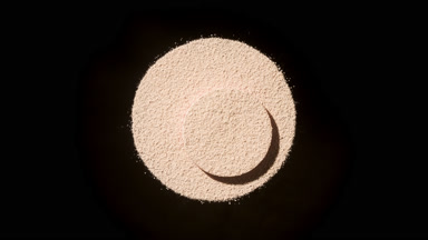 Beige Powder Dynamics: Circular Forms and Shadows