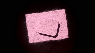 Pink Powder Overhead Shot: Changing Shadows on Black Surface