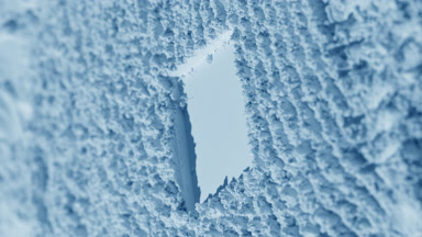 Pale Blue Powder Surface with Furrows and Shadow Movement