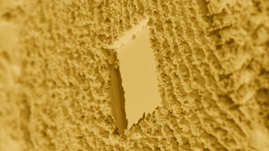 Yellow Powder Surface with Furrows and Moving Shadows