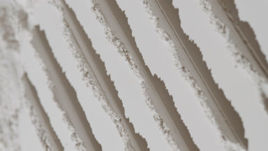 White Powder Surface with Linear Knife Trails and Shadows