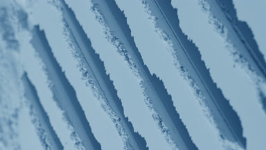 Pale Blue Powder Surface with Parallel Knife Marks and Light