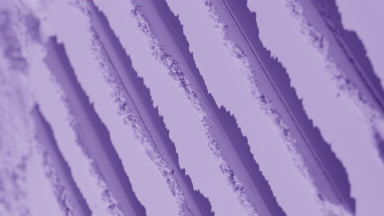 Violet Powder Surface with Structured Trails and Light